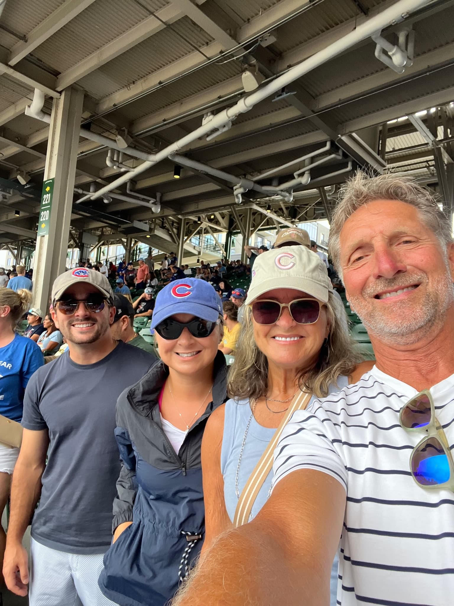 Family selfie at a Cubs game at Wrigley Field